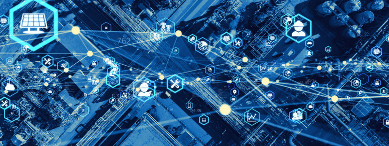 An overhead shot of a built up area with a blue overlay and multiple lines and icons connected throughout, representing virtual supply chains.