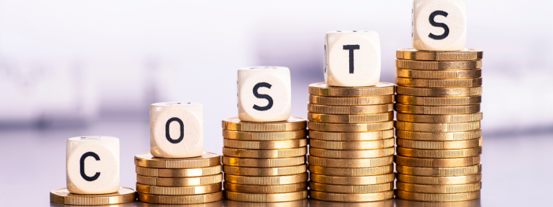 Ascending stacks of coins from left to right, with a letter on each spelling out 'costs', representing rising costs.