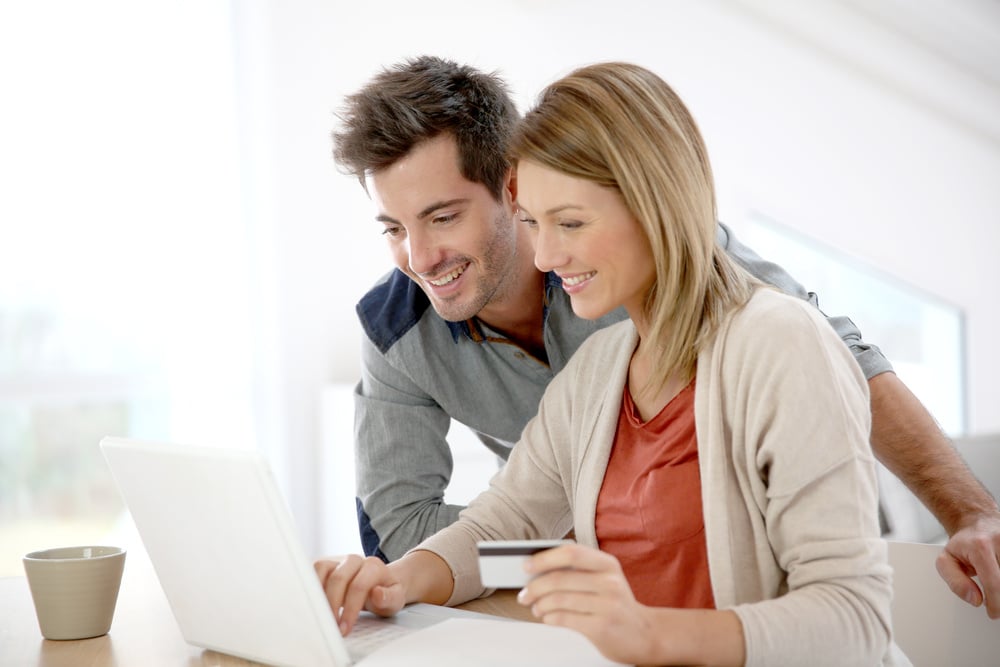 Couple at home buying on internet