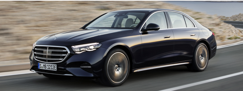 A recent model of the Mercedes E-Class on a road.