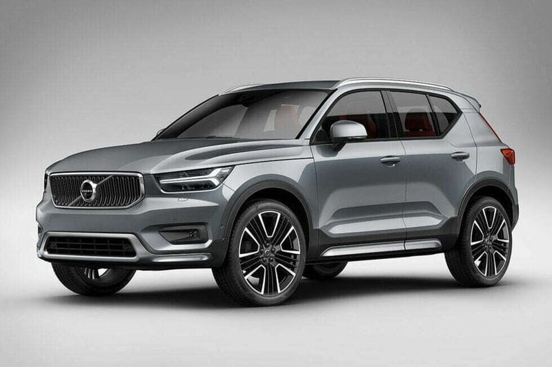 A grey Volvo XC40 against a blank background.