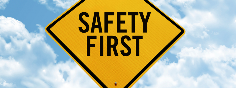 A close-up of a sign reading 'SAFETY FIRST'.