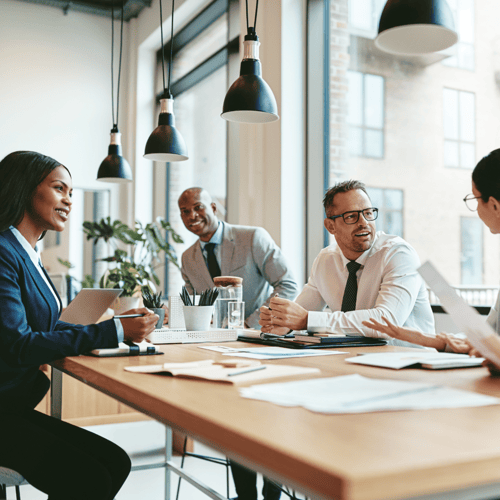 Business people deep in discussion in a business setting.