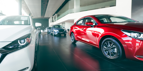 A red car in a car dealership